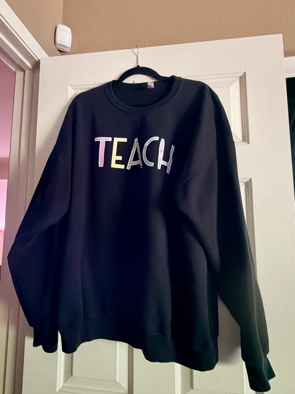 Jerzees Black Crewneck Sweatshirt with Multicolor TEACH Letters